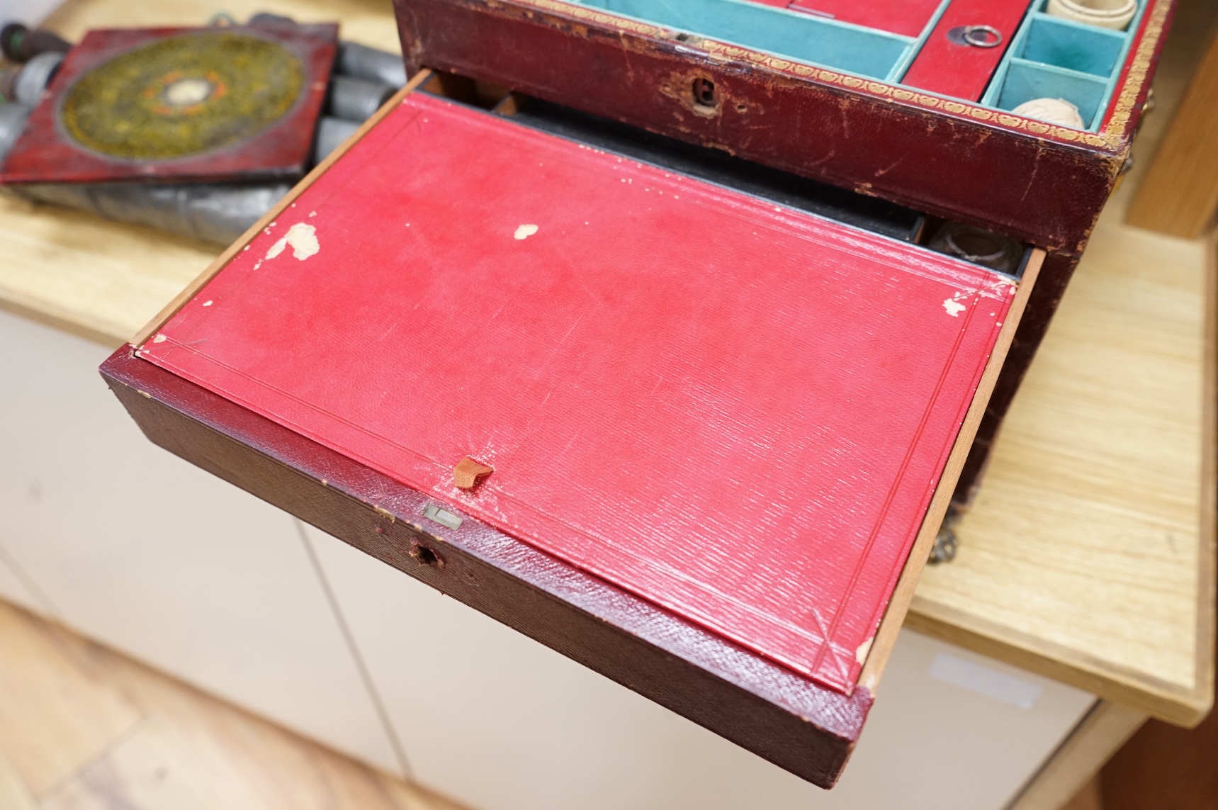 A Regency Morocco leather sewing and writing casket, 26cm and a Chinese Feng shui compass